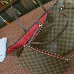 Louis Vuitton purse and cluth